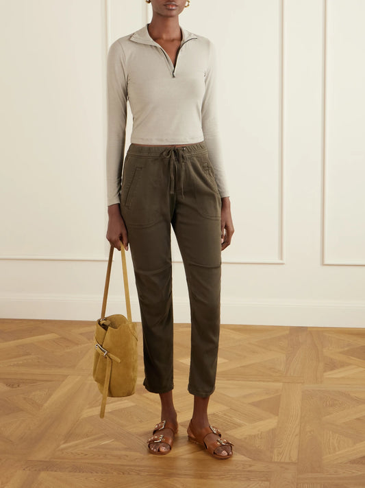 Image of a model wearing Tops. Product name - Cropped Cotton-blend Half-zip Top in Beige colour by brand - James Perse