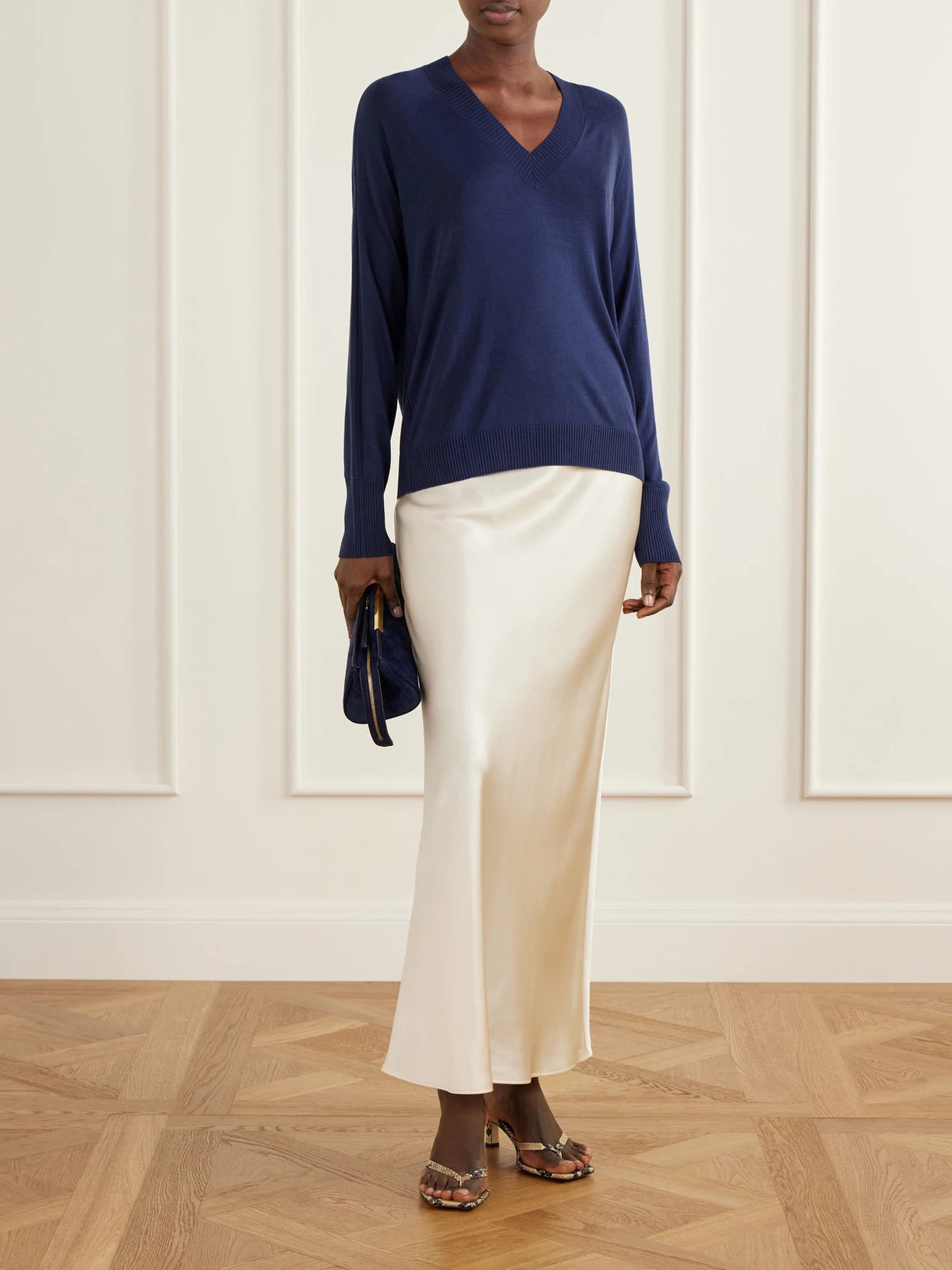 Image of a model wearing Outerwear. Product name - Gallow Silk Sweater in Blue colour by brand - Joseph