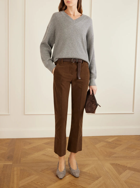 Image of a model wearing Pants. Product name - Cropped Cotton-blend Flared Pants in Brown colour by brand - Brunello Cucinelli