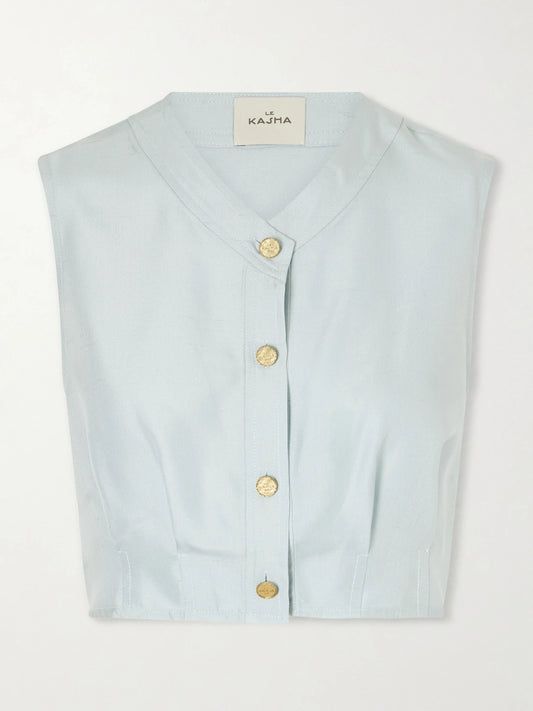 Image of a model wearing Tops. Product name - Haima V Neck Silk Top in Sky blue colour by brand - Le Kasha