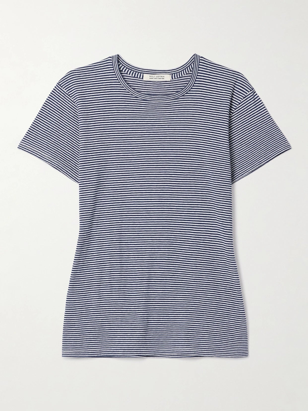 Image of a model wearing Tops. Product name - Lana Striped Cotton-jersey T-shirt in Navy colour by brand - Nili Lotan