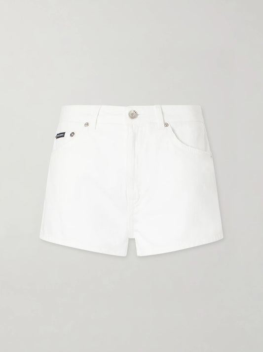 Image of a model wearing Shorts. Product name - Mid-rise Denim Shorts in White colour by brand - Dolce & Gabbana