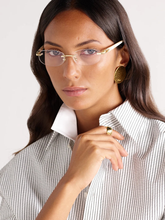 Image of Accessories. Product name - Oval-frame Rimless Gold-tone And Acetate Optical Glasses in Silver colour by brand - Cartier Eyewear
