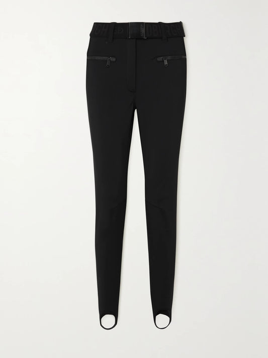 Image of a model wearing Pants. Product name - Paris Belted Stirrup Ski Pants in Black colour by brand - Goldbergh