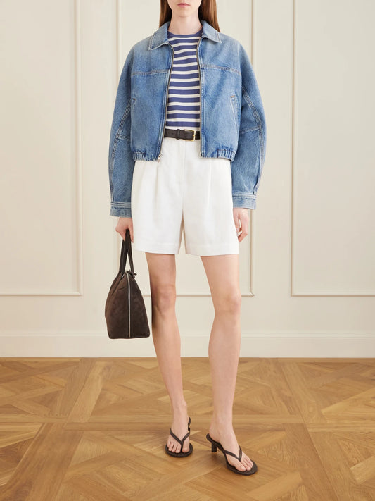 Image of a model wearing Tops. Product name - Lana Striped Cotton T-shirt in Blue colour by brand - Nili Lotan