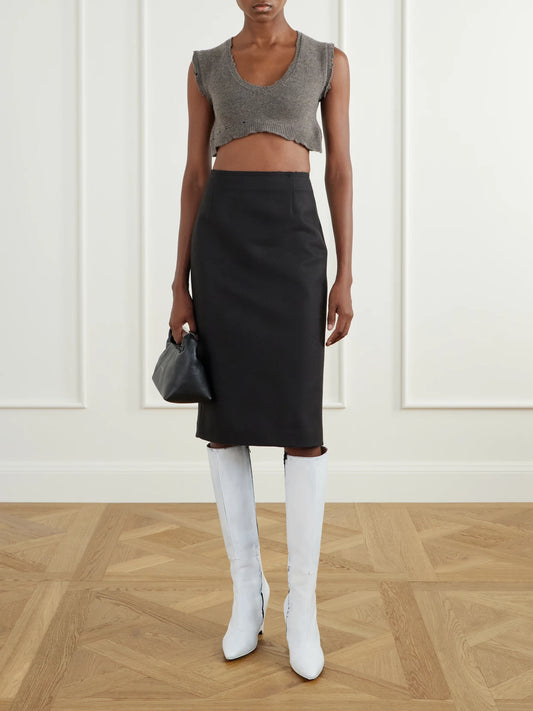 Image of a model wearing Outerwear. Product name - Virgin Wool Sweater in Brown colour by brand - Maison Margiela