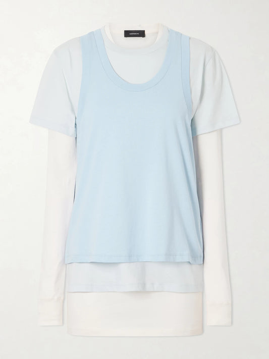 Image of a model wearing Tops. Product name - Layered Cotton-jersey T-shirt in Blue colour by brand - WARDROBE. NYC