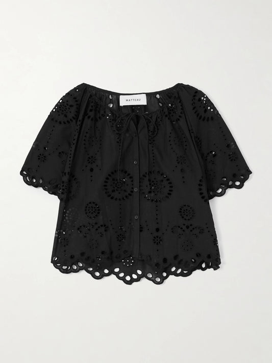 Image of a model wearing Tops. Product name - Scalloped Broderie Anglaise Cotton-poplin Shirt in Black colour by brand - Matteau