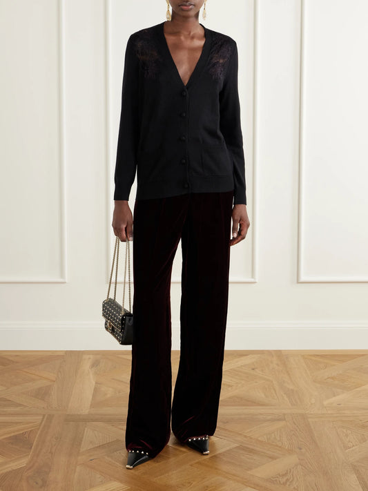 Image of a model wearing Outerwear. Product name - Lace-trimmed Wool Cardigan in Black colour by brand - Valentino Garavani
