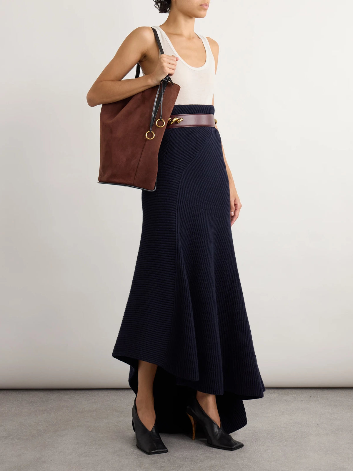 Image of a model wearing Tops. Product name - Wool-blend Tank in White colour by brand - Alaïa