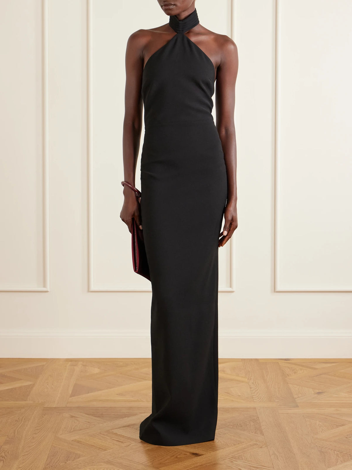 Image of Dresses. Product name - Kailash Crepe Halterneck Gown in Black colour by brand - Ilkyaz Ozel