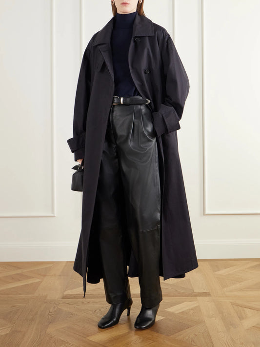 Image of a model wearing Pants. Product name - The Cornelia Pleated Paneled Leather Straight-leg Pants in Black colour by brand - Giuliva Heritage