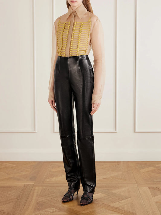 Image of a model wearing Tops. Product name - Ivy Silk-organza Blouse in Beige colour by brand - KHAITE