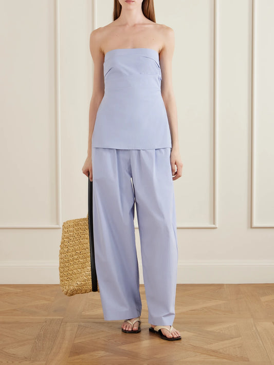 Image of a model wearing Pants. Product name - Everyday Cotton-blend Poplin Wide-leg Pants in Light blue colour by brand - ST. AGNI