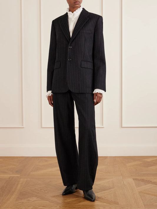 Image of a model wearing Tops. Product name - Elio Ruffle-trimmed Cotton-poplin Shirt in White colour by brand - Nili Lotan
