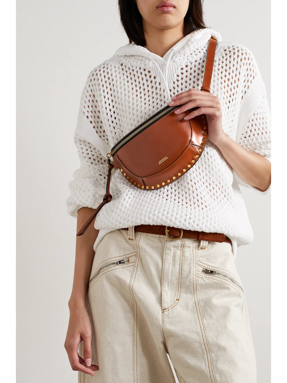 Image of Bags. Product name - Skano Studded Leather Belt Bag in Brown colour by brand - ISABEL MARANT