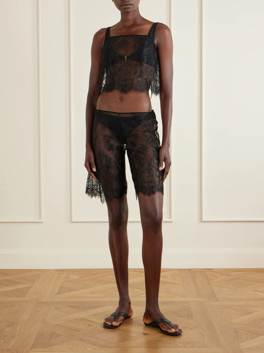 Image of a model wearing Shorts. Product name - Sabine Lace Bermuda Shorts in Black colour by brand - Kiki de Montparnasse