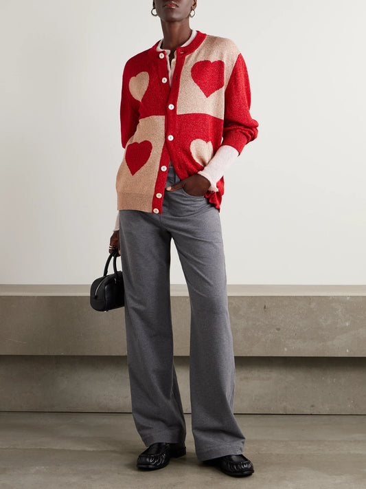 Image of a model wearing Outerwear. Product name - Two-tone Lamé Cardigan in Red colour by brand - BODE