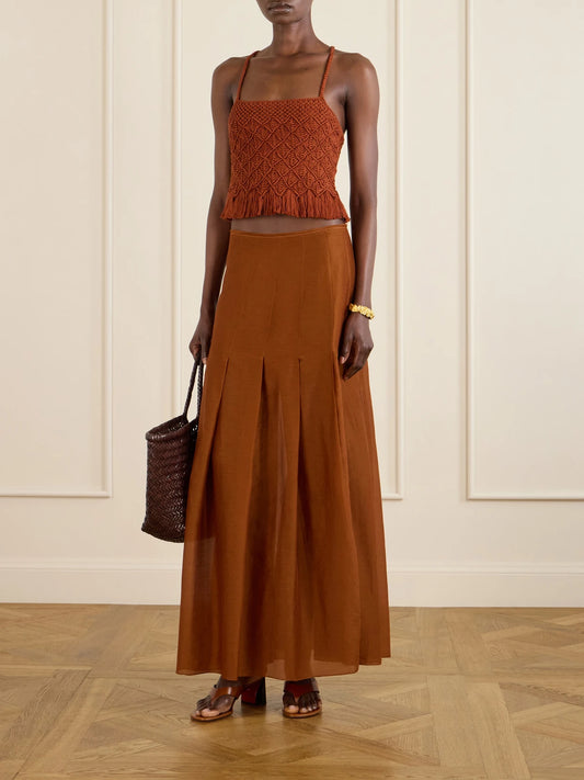 Image of a model wearing Skirts. Product name - Lauri Cotton Maxi Skirt in Brown colour by brand - ESCVDO