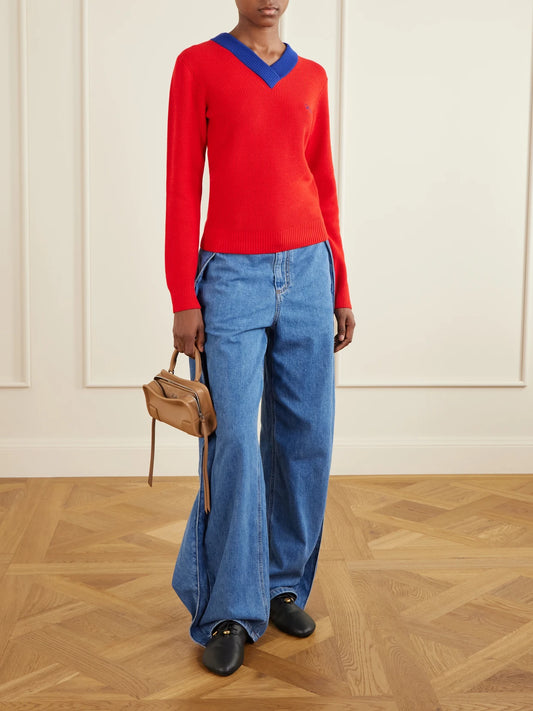Image of a model wearing Outerwear. Product name - Anagram-embroidered Ribbed-knit Cotton And Wool-blend Sweater in x small colour by brand - LOEWE