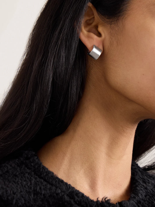 Image of Jewelry. Product name - Petite Signature Recycled Rhodium-plated Hoop Earrings in Silver colour by brand - TOTEME