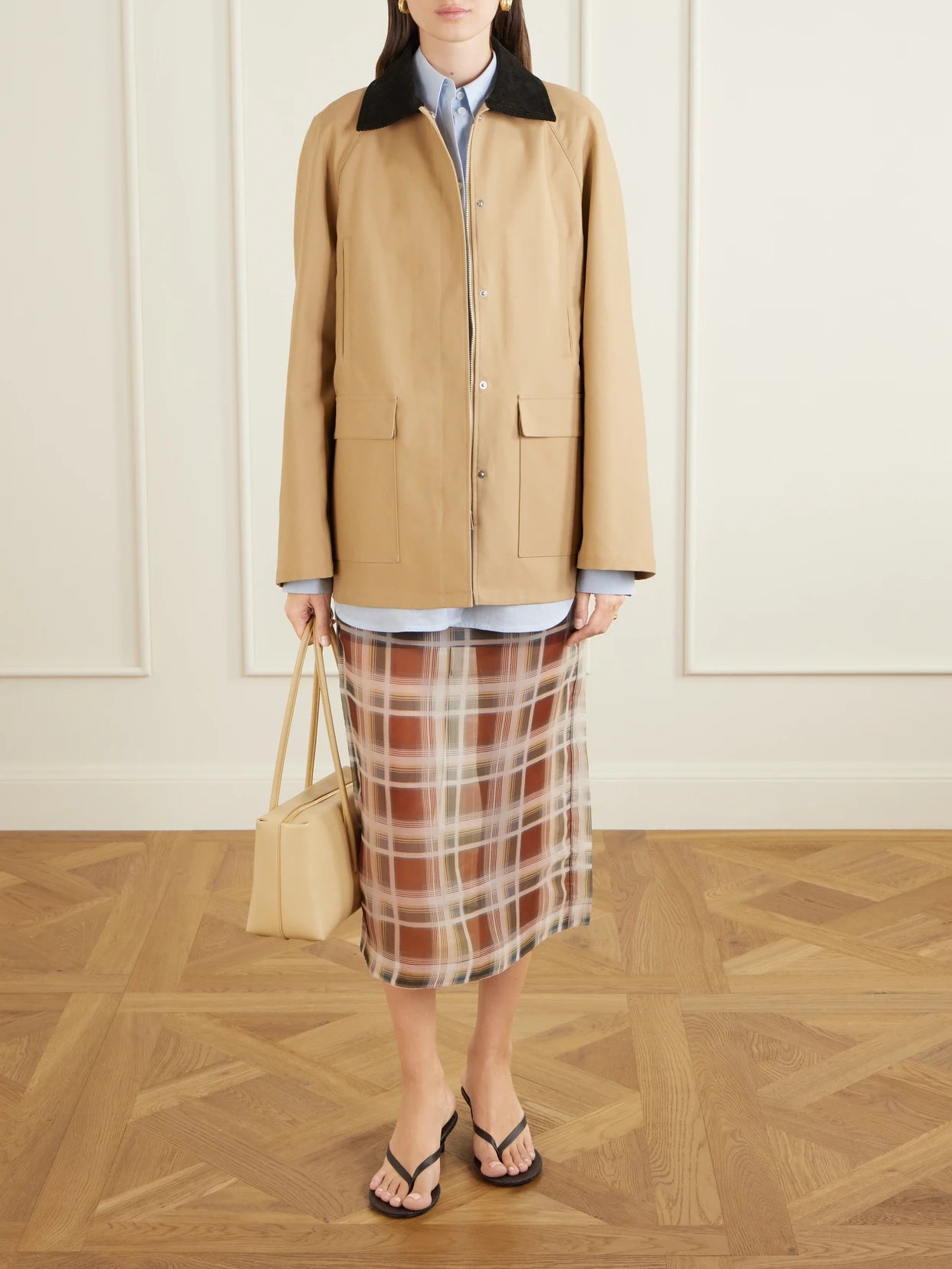 Image of a model wearing Skirts. Product name - Checked Silk-organza Midi Skirt in Brown colour by brand - FRAME