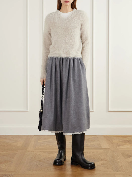 Image of a model wearing Outerwear. Product name - Cropped Brushed Plush Sweater in Gray colour by brand - Maria McManus