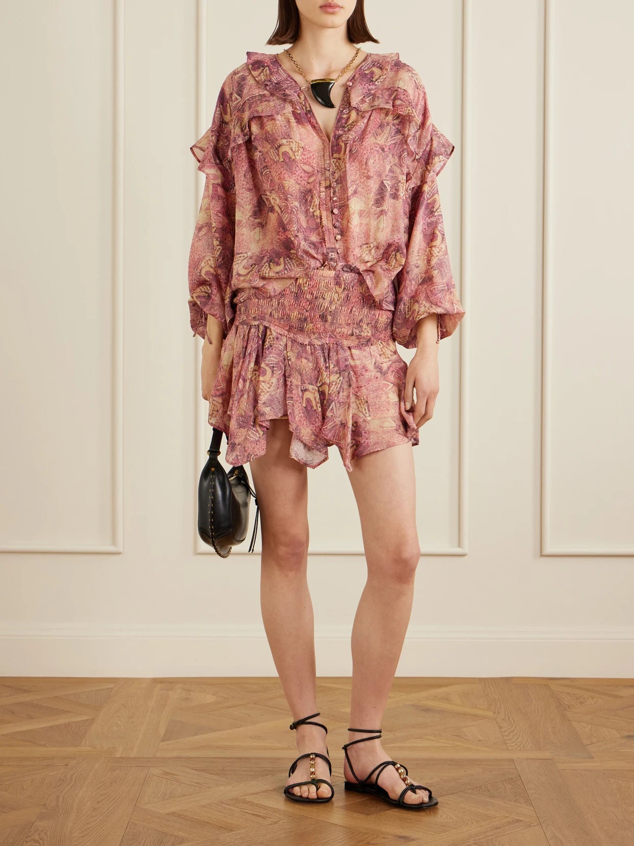 Image of a model wearing Skirts. Product name - Ceiva Silk-chiffon Mini Skirt in Pink colour by brand - ISABEL MARANT