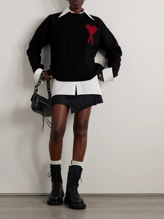 Image of a model wearing Outerwear. Product name - + Net Sustain Adc Intarsia Wool Sweater in Black colour by brand - AMI PARIS