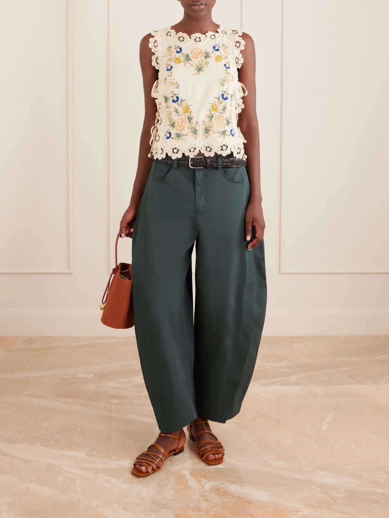 Image of a model wearing Pants. Product name - Odessa Belted Cotton Wide-leg Pants in Green colour by brand - Sea