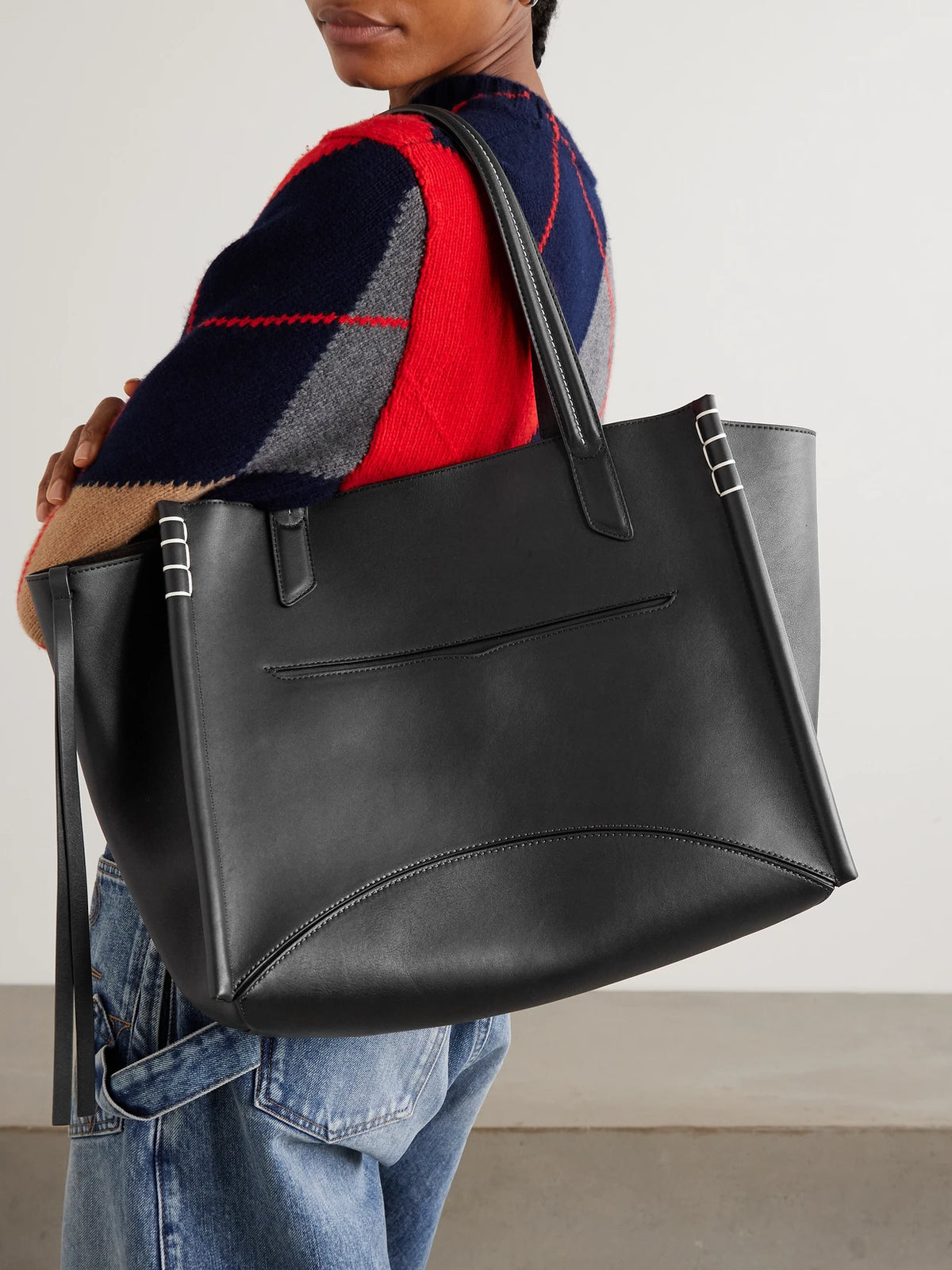 Image of Bags. Product name - Loafer Cabas Tasseled Leather Shoulder Bag in Black colour by brand - JW Anderson