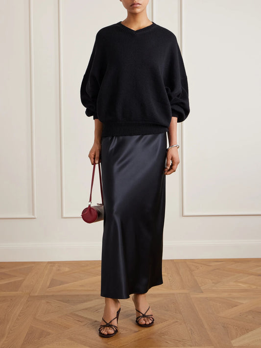 Image of a model wearing Skirts. Product name - Isaak Silk-satin Maxi Skirt in Black colour by brand - Joseph