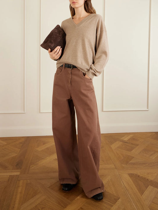 Image of a model wearing Outerwear. Product name - Cashmere Sweater in Brown colour by brand - Brunello Cucinelli
