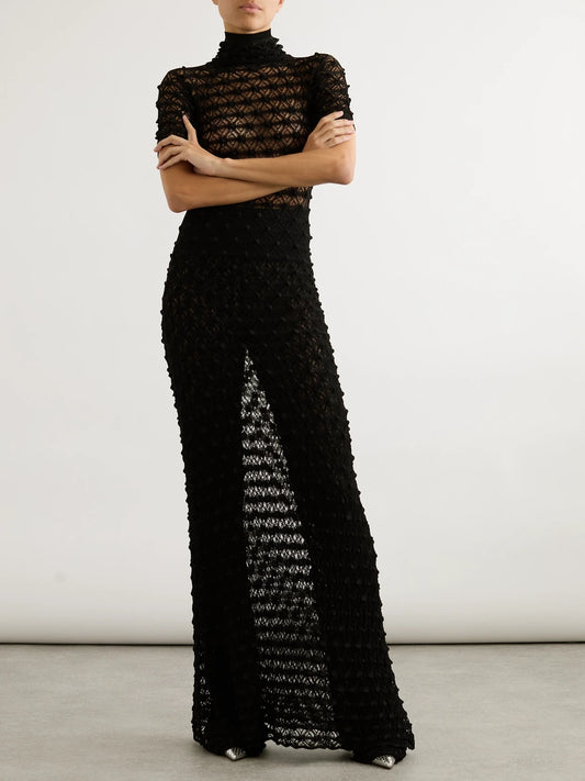Image of a model wearing Pants. Product name - Open-knit Straight-leg Pants in Black colour by brand - Alaïa