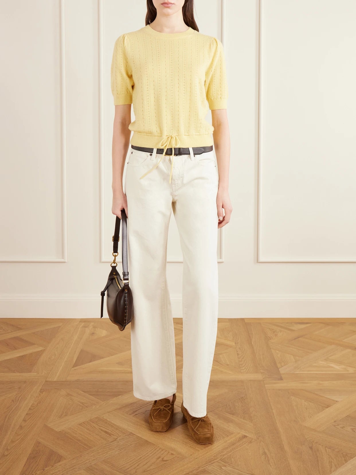 Image of a model wearing Outerwear. Product name - Charm Knitted Cashmere Sweater in Yellow colour by brand - FRAME
