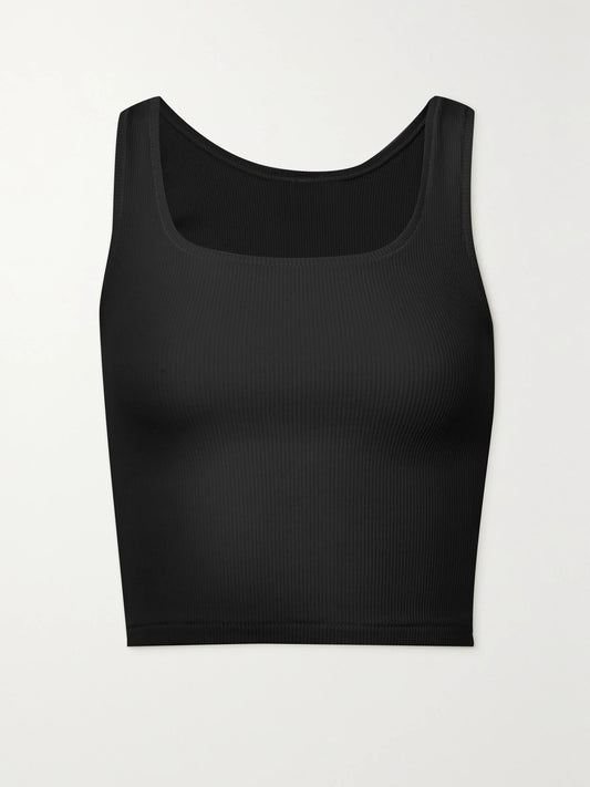 Image of a model wearing Tops. Product name - Ribbed Cotton-blend Jersey Tank - Soot in Black colour by brand - SKIMS