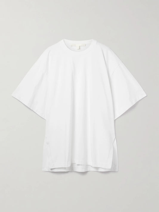 Image of a model wearing Tops. Product name - The Holt Oversized Organic Cotton-jersey T-shirt in White colour by brand - RÙADH