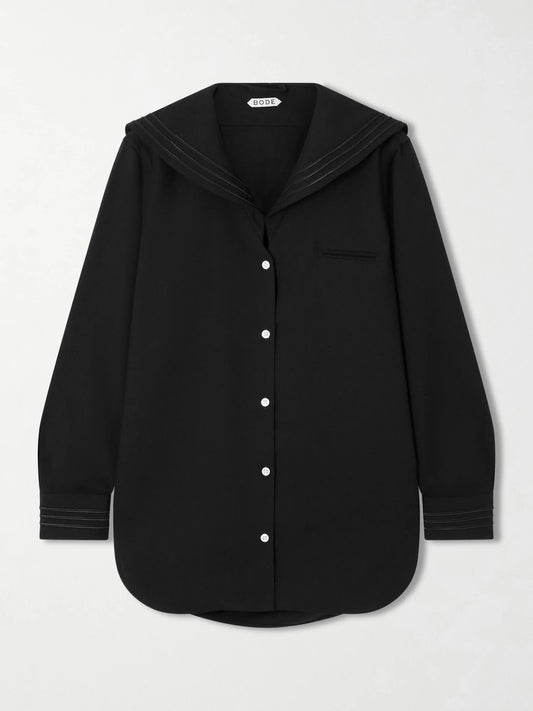 Image of a model wearing Tops. Product name - Astor Wool-crepe Blouse in Black colour by brand - BODE