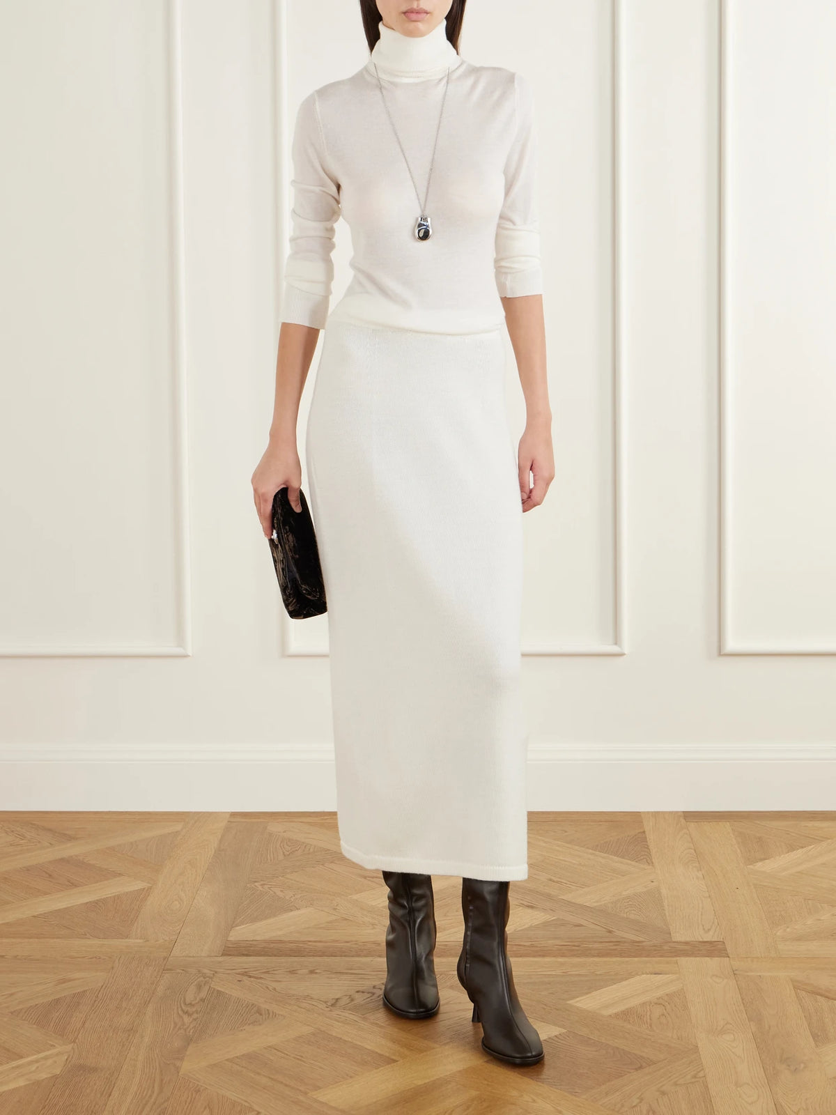 Image of a model wearing Outerwear. Product name - Marshall Cashmere And Silk-blend Turtleneck Sweater in White colour by brand - THE PARK