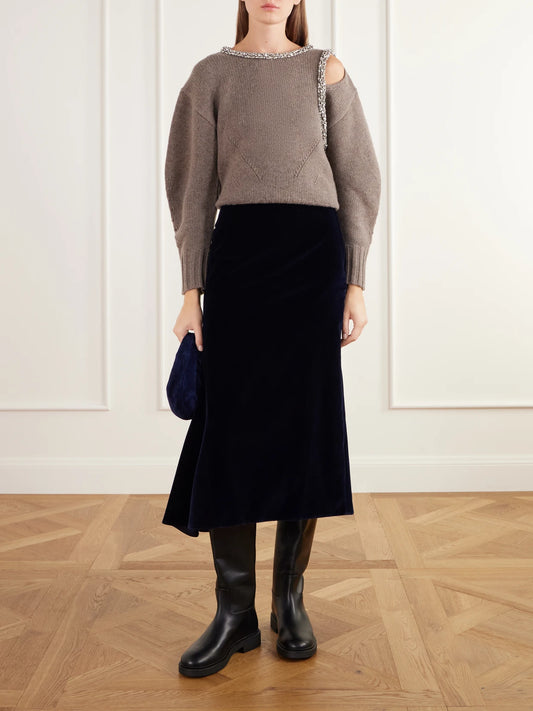 Image of a model wearing Skirts. Product name - Draped Asymmetric Cotton-velvet Midi Skirt in Navy colour by brand - Erdem