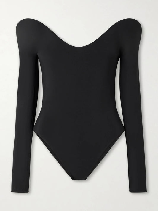 Image of a model wearing Tops. Product name - Open-back Padded Jersey Bodysuit in Black colour by brand - Alaïa