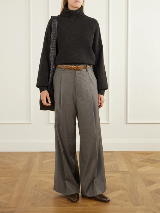 Image of a model wearing Outerwear. Product name - Bangkok Knitted Cashmere Sweater in Dark brown colour by brand - Le Kasha