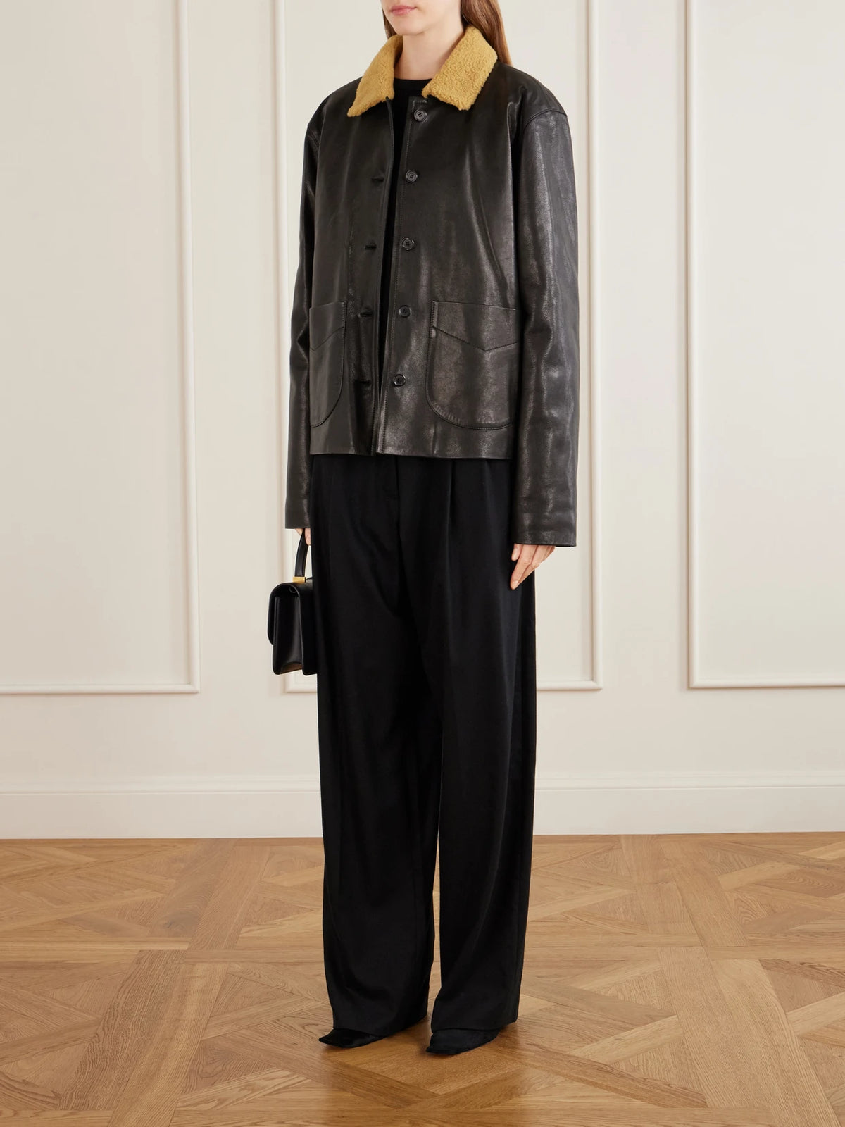Image of Coats & Jackets. Product name - Wilson Shearling-trimmed Grained Leather Jacket in Black colour by brand - KHAITE