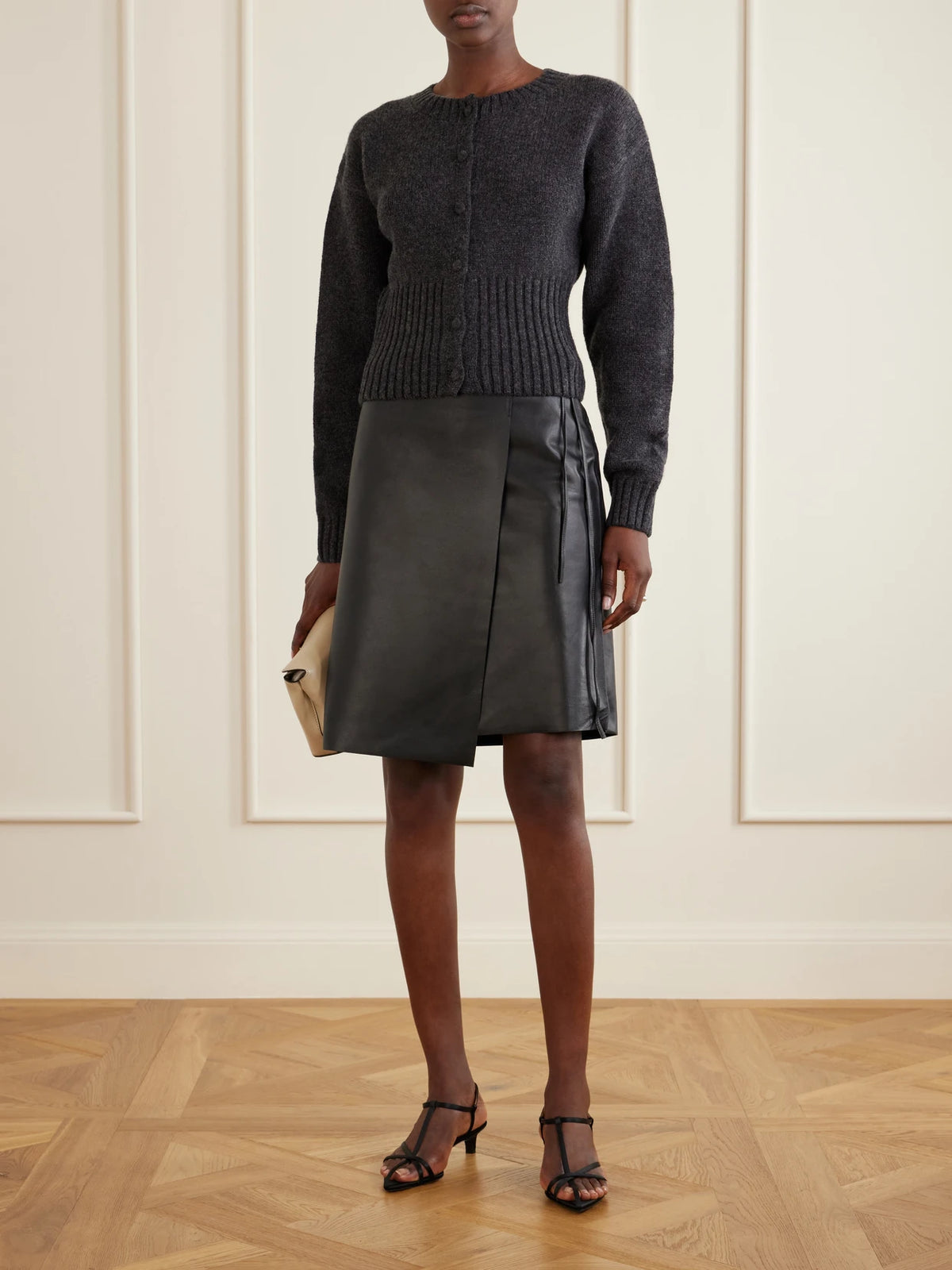 Image of a model wearing Outerwear. Product name - Cropped Wool Cardigan in Gray colour by brand - ST. AGNI