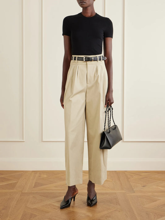 Image of a model wearing Tops. Product name - Manny Woven T-shirt in Black colour by brand - Altuzarra