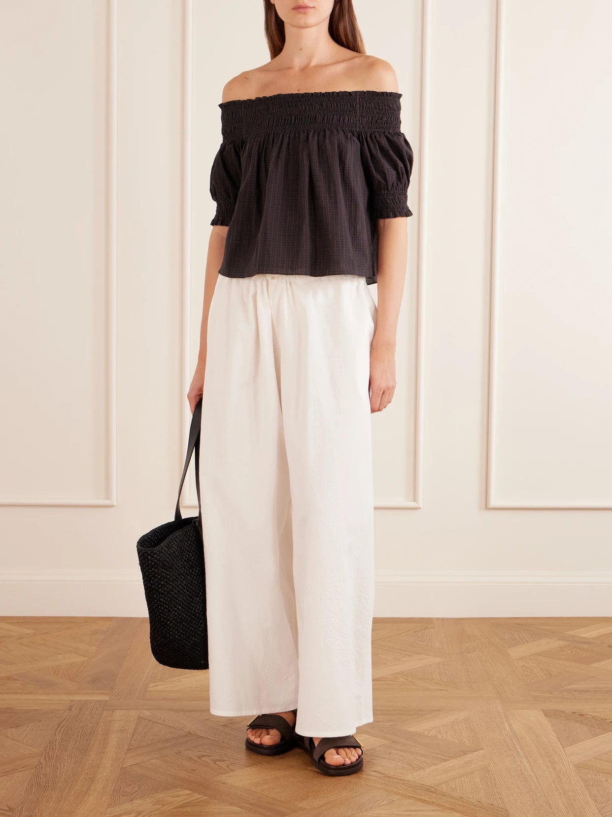Image of a model wearing Tops. Product name - Shirred Off-the-shoulder Checked Cotton Blouse in Brown colour by brand - Matteau
