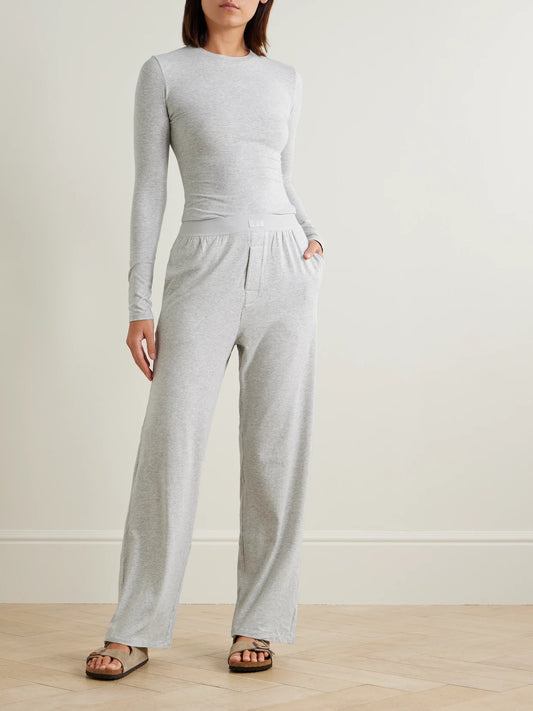 Image of Sleepwear & Loungewear. Product name - Boyfriend Stretch-modal And Cotton-blend Jersey Track Pants - Light Heather Grey in Light gray colour by brand - SKIMS