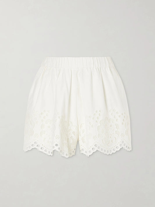 Image of a model wearing Shorts. Product name - Gardener Embroidered Cotton And Linen-blend Shorts in White colour by brand - Sea
