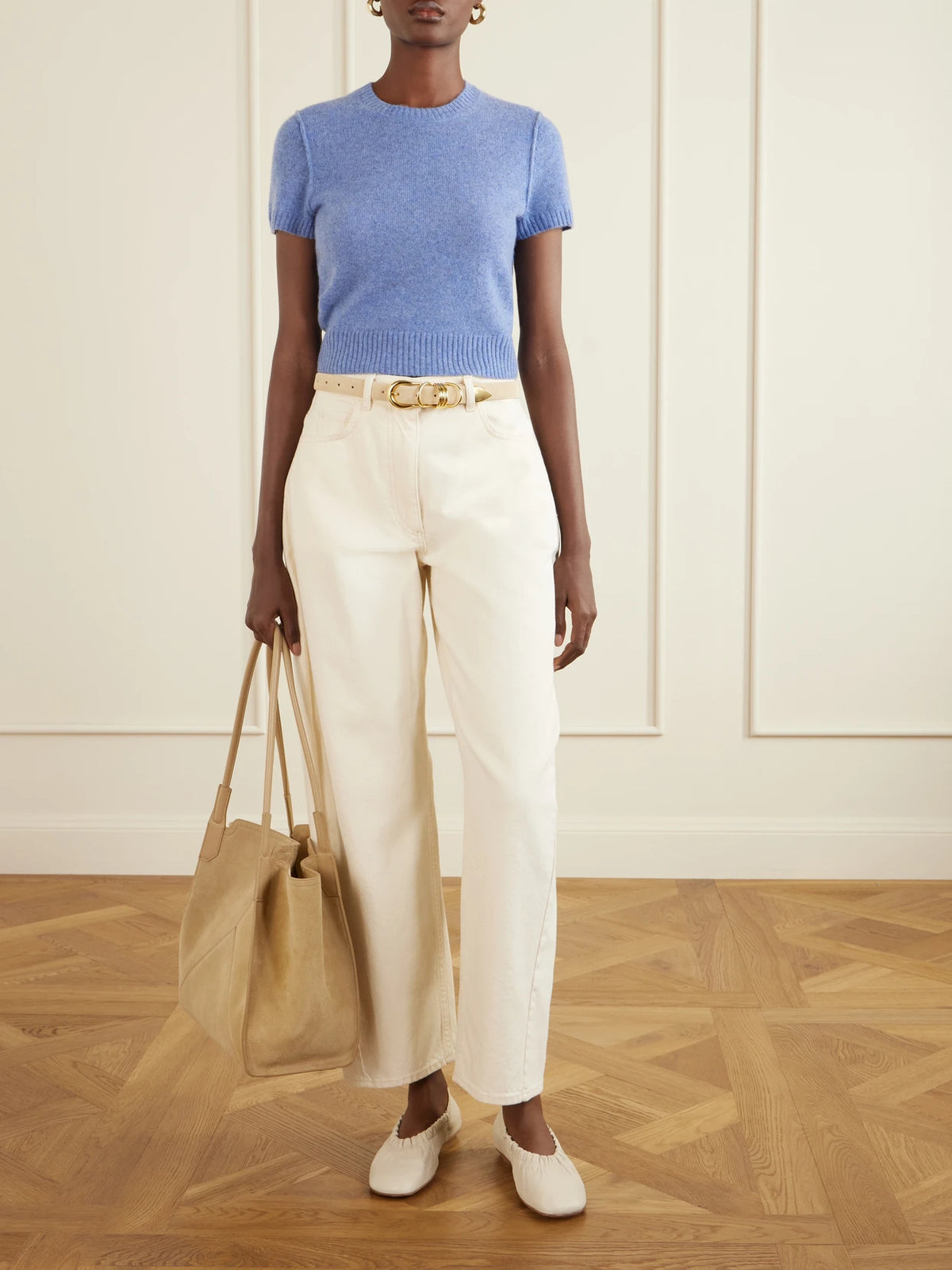 Image of a model wearing Outerwear. Product name - Cashmere T-shirt in Blue colour by brand - James Perse