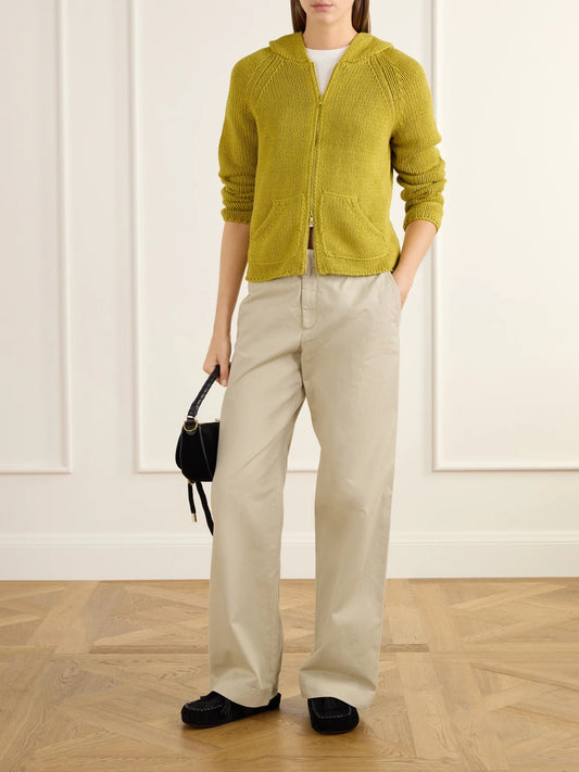 Image of a model wearing Outerwear. Product name - Bear Hooded Cotton Cardigan in Mustard colour by brand - Still Here